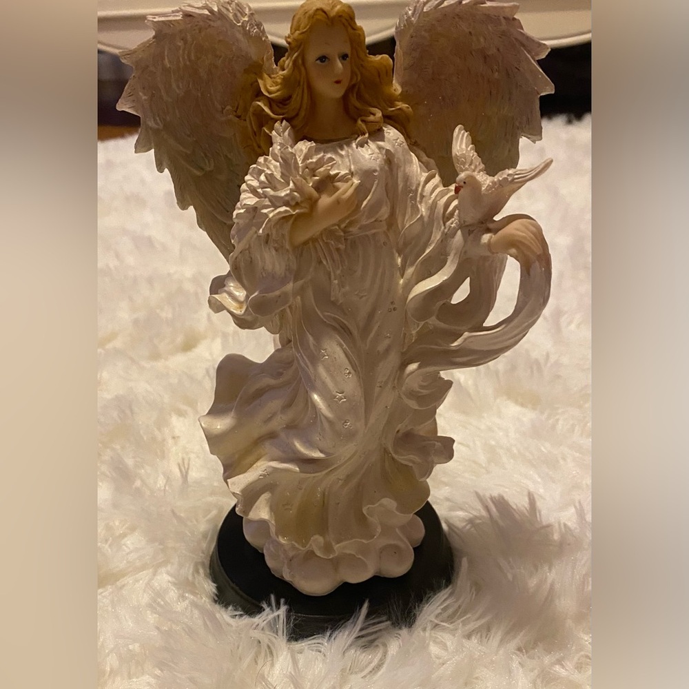 Beautiful Angel with dove and flowers figurine-statue.
